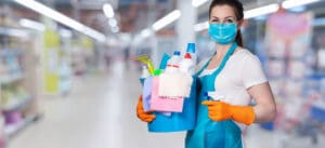 woman with cleaning supplies